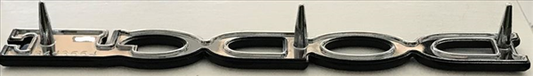 VC3554 - Fits various 1971 Dart Swinger and Demon models Hood and Trunk. 3443554 3 Pin Emblem 5 1/4" long 11/16 tall.