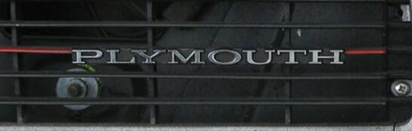 VC159 - 1970 Barracuda PLYMOUTH grille emblem with the correct font style with a chrome finish on a black background. 5 1/2 inches long. Includes hardware.