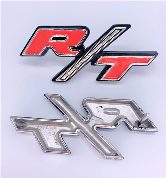 VC2389 - 1969 Charger R/T Tail Panel Emblem. Includes mounting hardware. 1 Emblem - Mopar emblem product image