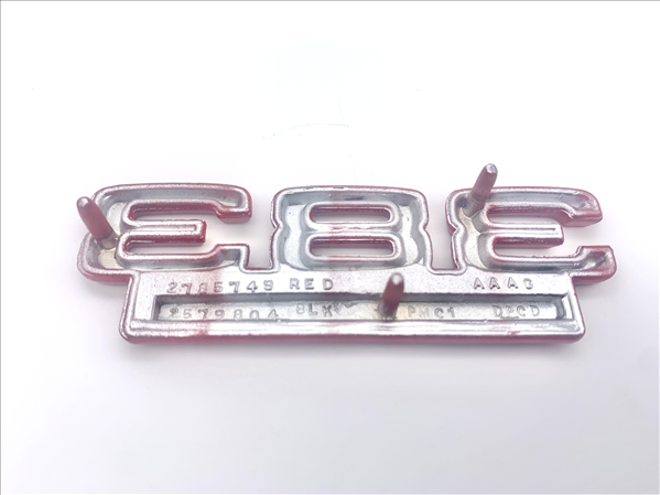VC5749 - 1966 Charger 383 four barrel fender emblem with red accent. OE 2785749