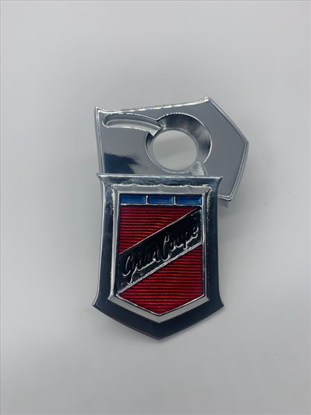 VC47689 - 1970-1971 Barracuda Gran Coupe Trunk Lock Cover Emblem. Includes hardware. You must use your original spring for this emblem.