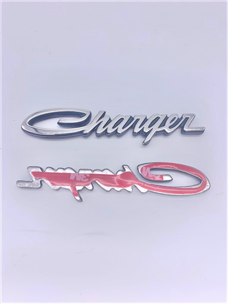 VC0687T - 1972 Charger fender emblem for SE models and 1972-1974 Charger Trunk Lid emblem.