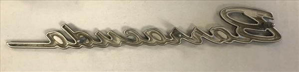 VC0876B - 1968 Barracuda Trunk Lid emblem. Brushed finish with Black edges. Attaches by 3 pins. - Mopar emblem product image