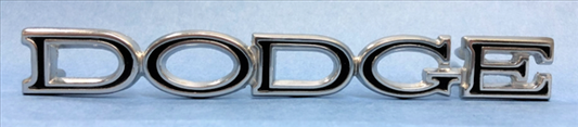 VC1813 - 1969 Dodge Dart Reproduction DODGE trunk lid emblem . This is for cars that do not have a DODGE molding or finish panel. 2901813 2 pin emblem and 6 5/8" long x 13/16" tall