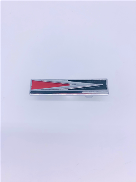 VC8279 - 1970 Charger Arrow Headlight Door Grille emblem.