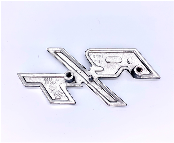 VC8931 - 1969 Charger R/T headlight door emblem. Includes mounting hardware. - Mopar emblem product image