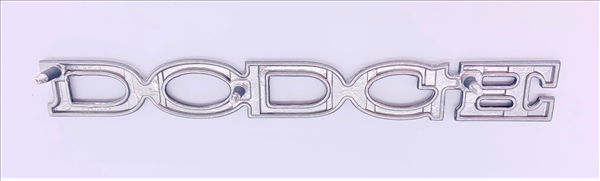 VC64442 - 1969 Dart DODGE Hood and 1971 Trunk emblem. Verify Length. 6 11/16" long x 13/16" tall - Mopar emblem product image